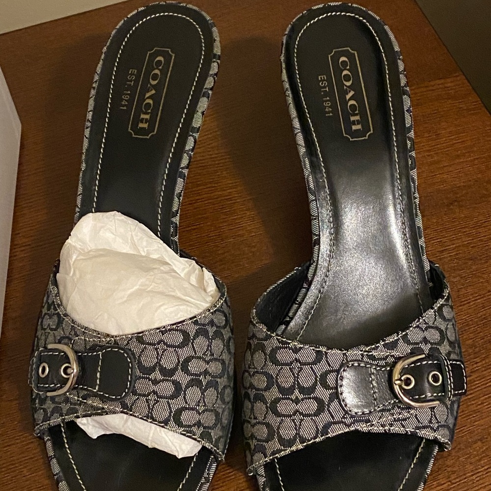 Excellent condition Coach white and black low heels.